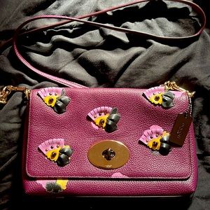 Purple crossbody Coach purse